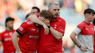 <p>Louth Manager Gavin Devlin consoles a dejected Ciaran Keenan. Pic: Laszlo Geczo/Inpho</p> <p>Louth Manager Gavin Devlin consoles a dejected Ciaran Keenan. Pic: Laszlo Geczo/Inpho</p>