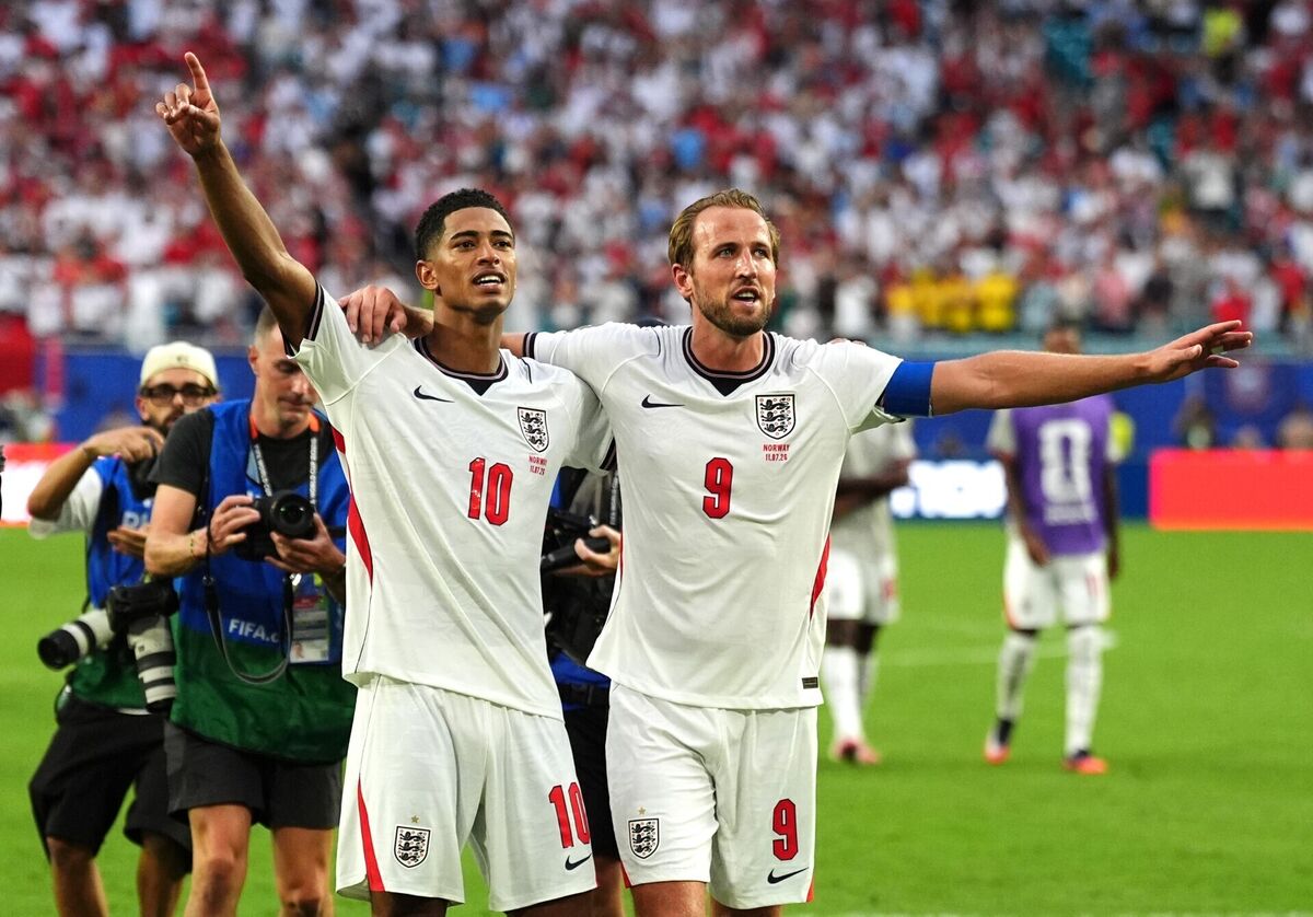 Bellingham and Harry Kane salute the fans at the Miami Stadium. Pic: Martin Rickett/PA