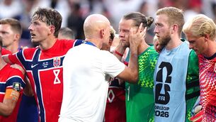<p>Norway manager Stale Solbakken consoles goalkeeper Orjan Nyland after their extra time defeat to England in Miami. Pic: Bradley Collyer/PA Wire.</p>