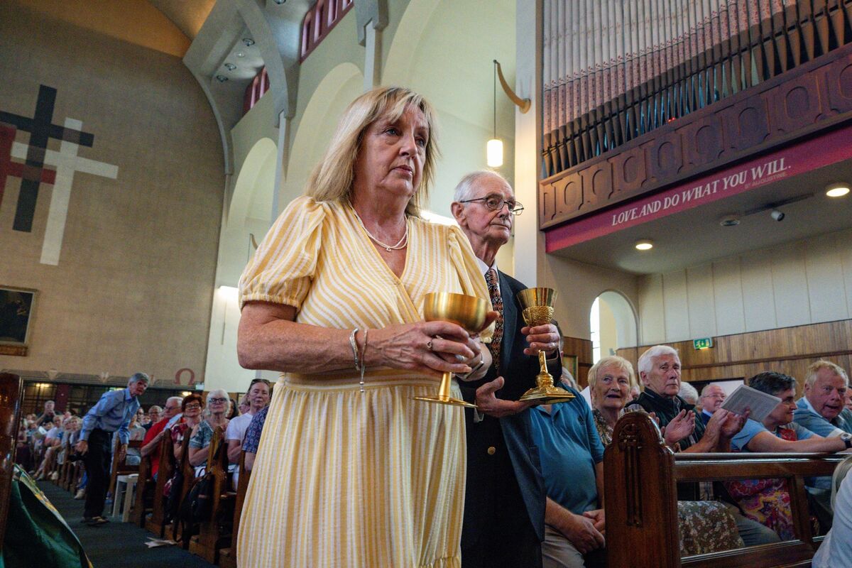  The gifts are brought to the altar during the final Mass at St Augustine’s Church. Picture: Chani Anderson