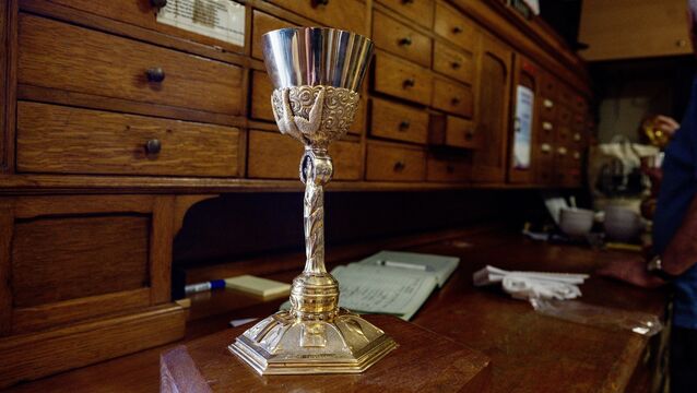 <p>The Christy Ring Chalice in the sacristy of St Augustine’s Church in Cork city centre today, Sunday. Partly made with the melted-down All-Ireland senior medal won by 'Ringy', the vessel was used during the final Mass celebrated at the church today. Picture: Chani Anderson</p>