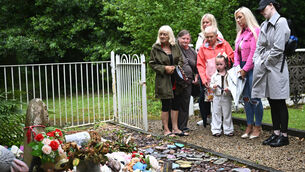 <p> Mother and baby home survivor Ann O'Gorman and family members taking part in the recent vigil at Bessborough in Cork. Picture: Larry Cummins</p>