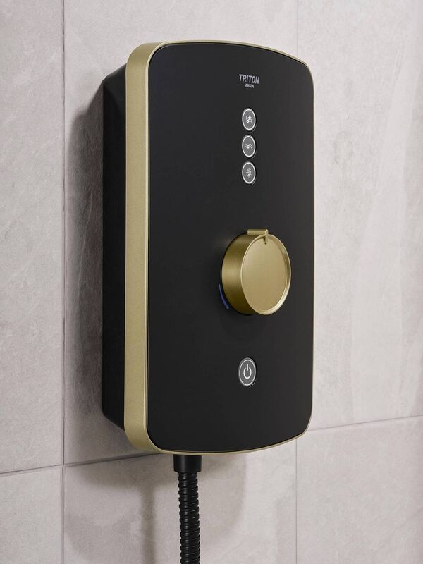 This handsome housing will take a simple swap with a microfibre cloth to remain in perfect condition; Triton Amala brushed black and brass, DuElec 9.5kW shower, including shower-head, from €294. 
