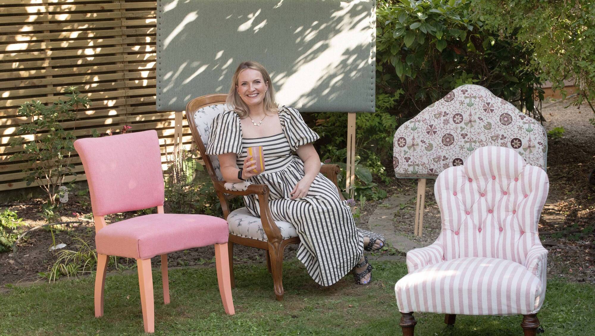 Sara Harrison relaxing outdoors this week with some pieces of furniture she has reupholstered. Picture: Moya Nolan