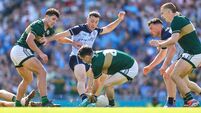 Cormac Costello challenges Paul Murphy for the ball 12/7/2026