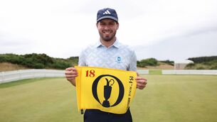 <p>David Howard holds up The Open pin flag after qualifying for The 154th Open at Royal Birkdale at Dundonald Links in Troon. Pic: Ross Parker/Getty</p> <p>David Howard holds up The Open pin flag after qualifying for The 154th Open at Royal Birkdale at Dundonald Links in Troon. Pic: Ross Parker/Getty</p>