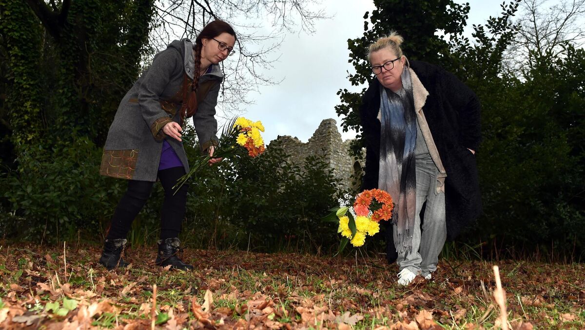 Maureen Considine (left) and Catherine Coffey-Brien of the Cork Survivors and Supporters Alliance laying flowers near the Folly at Bessborough. Picture: Eddie O’Hare Maureen Considine (left) and Catherine Coffey-Brien of the Cork Survivors and Supporters Alliance laying flowers near the Folly at Bessborough. Picture: Eddie O’Hare