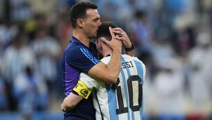 <p>LIONEL THE GREAT(S): Argentina's head coach Lionel Scaloni kisses Argentina's Lionel Messi.</p>