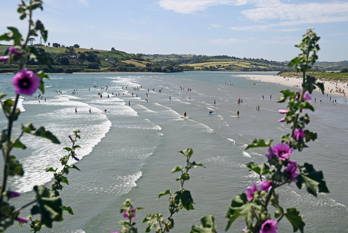 Enjoying the sunshine at Inchydoney beach in West Cork on Sunday. In the final days of June, Met Éireann declared an official heatwave after weather stations in Carlow, Cork and Tipperary recorded five consecutive days above 25°C. Picture: Denis Minihane Enjoying the sunshine at Inchydoney beach in West Cork on Sunday. In the final days of June, Met Éireann declared an official heatwave after weather stations in Carlow, Cork and Tipperary recorded five consecutive days above 25°C. Picture: Denis Minihane