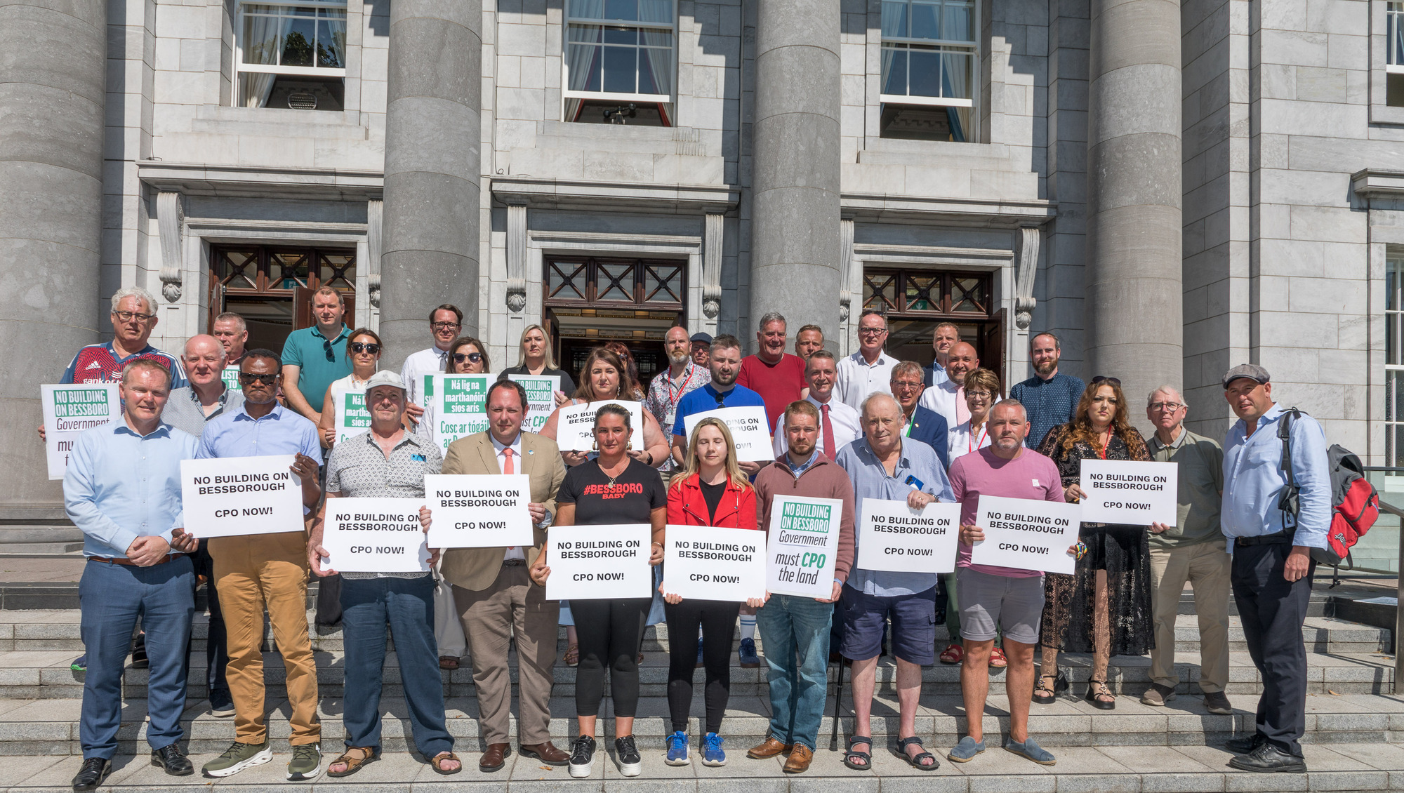 Survivors of Bessborough with city councillors, TDs, and supporters at a protest at Cork City Hall. Picture: David Creedon