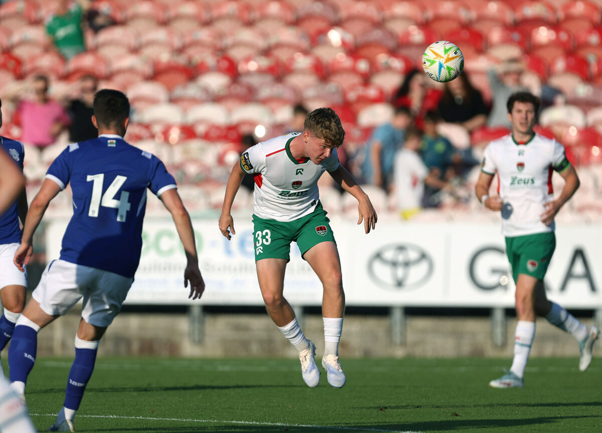 Tom McGrath ofCork City and David Turnbull (14), Cardiff City. Pic: Jim Coughlan. Tom McGrath ofCork City and David Turnbull (14), Cardiff City. Pic: Jim Coughlan.