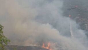 <p>Kerry County Council had yesterday asked the public to avoid the area of Five Mile Bridge on the N71 Killarney-Kenmare road due to a fire in Killarney National Park. Picture: Kerry County Council </p>