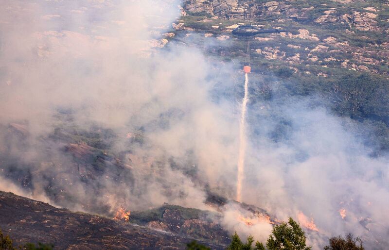 The wildfire was brought under control following a rapid and coordinated response by Kerry Fire and Rescue Service and National Parks and Wildlife Service (NPWS) staff. Two helicopters were deployed using Bambi buckets to assist ground crews in tackling the blaze. Further assessment will be carried out today. Photo: Valerie O'Sullivan The wildfire was brought under control following a rapid and coordinated response by Kerry Fire and Rescue Service and National Parks and Wildlife Service (NPWS) staff. Two helicopters were deployed using Bambi buckets to assist ground crews in tackling the blaze. Further assessment will be carried out today. Photo: Valerie O'Sullivan