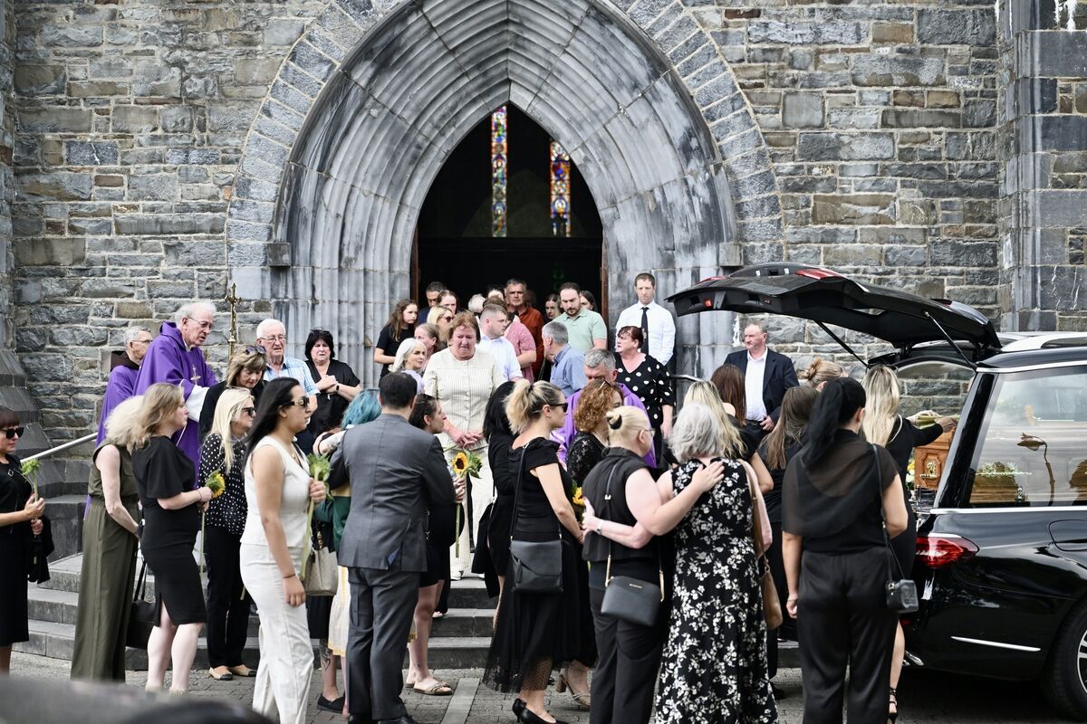 Members of Dr Crokes GAA club formed a Guard Of Honor as the cortège left the cathedral and made its way through the town. Picture: Larry Cummins Members of Dr Crokes GAA club formed a Guard Of Honor as the cortège left the cathedral and made its way through the town. Picture: Larry Cummins