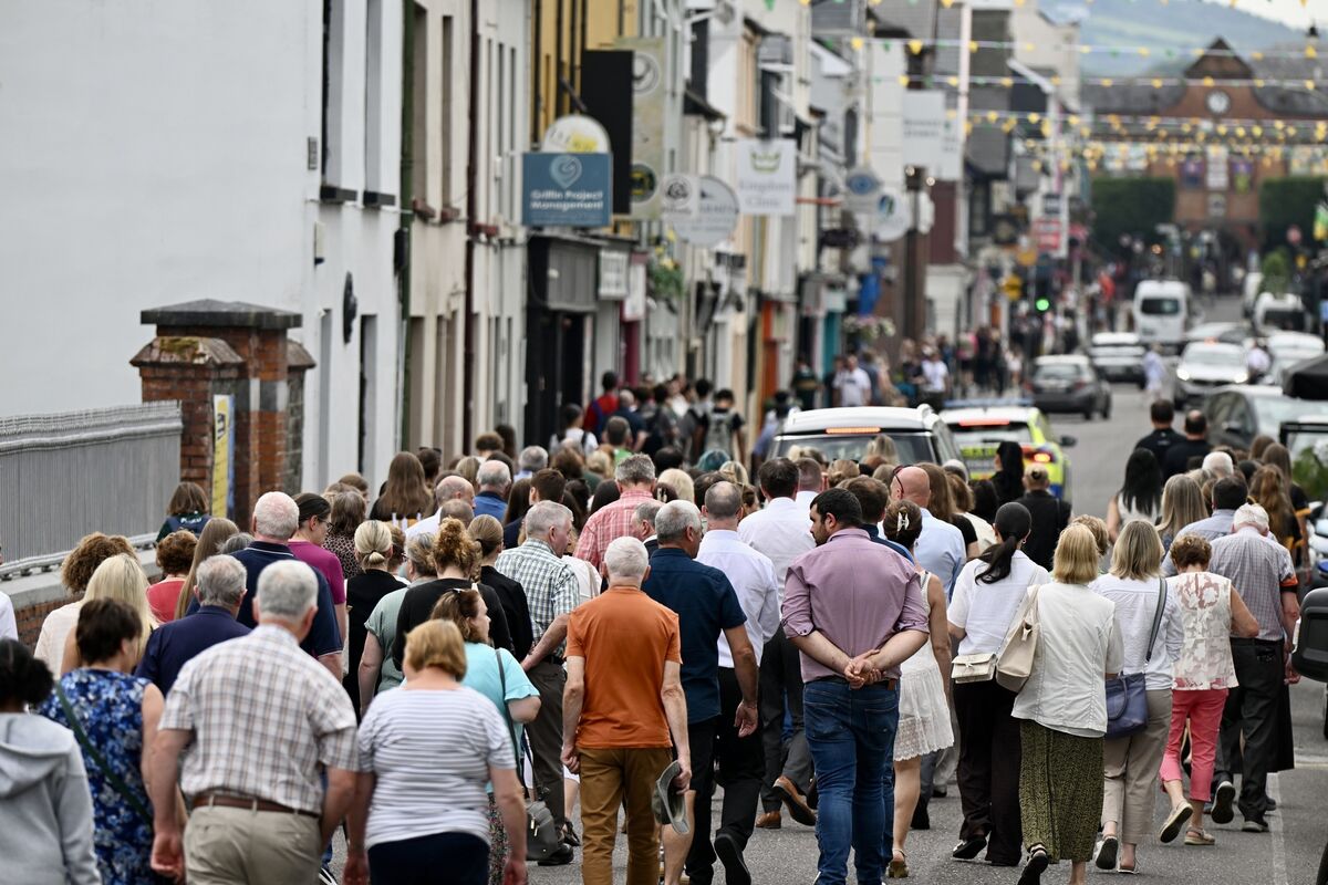 Members of Dr Crokes GAA club formed a Guard Of Honor as the cortège left the cathedral and made its way through the town. Picture: Larry Cummins Members of Dr Crokes GAA club formed a Guard Of Honor as the cortège left the cathedral and made its way through the town. Picture: Larry Cummins