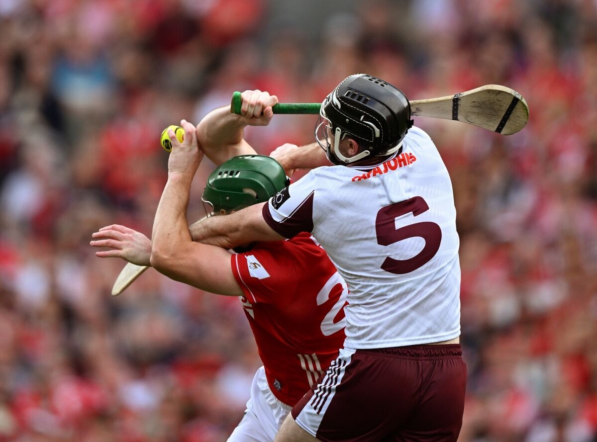 Cork's Robbie O'Flynn is tackled by Galway's Padraic Mannion. Pic: Ray McManus/Sportsfile. Cork's Robbie O'Flynn is tackled by Galway's Padraic Mannion. Pic: Ray McManus/Sportsfile.