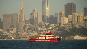 A San Francisco Fire Department vessel passes the city skyline while searching for missing victims after a boat accident near Alcatraz Island off San Francisco (Noah Berger/AP) A San Francisco Fire Department vessel passes the city skyline while searching for missing victims after a boat accident near Alcatraz Island off San Francisco (Noah Berger/AP)