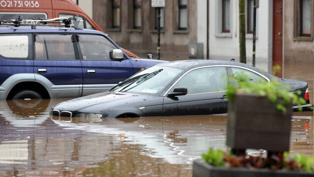 <p>Submerged cars during the 2012 flooding in Blackpool, Cork. Irish Examiner Archive picture: Des Barry</p>