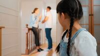 Stressed and unhappy young girl hide from domestic violence at home. Synchronos