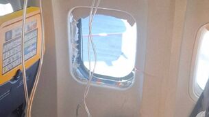 <p>A broken window and the interior of the Ryanair aircraft, following a reported emergency landing, in location given as Thessaloniki, Greece.</p> <p>A broken window and the interior of the Ryanair aircraft, following a reported emergency landing, in location given as Thessaloniki, Greece.</p>