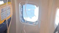 A broken window and the interior of the Ryanair aircraft, following a reported emergency landing, in location given as Thessalon