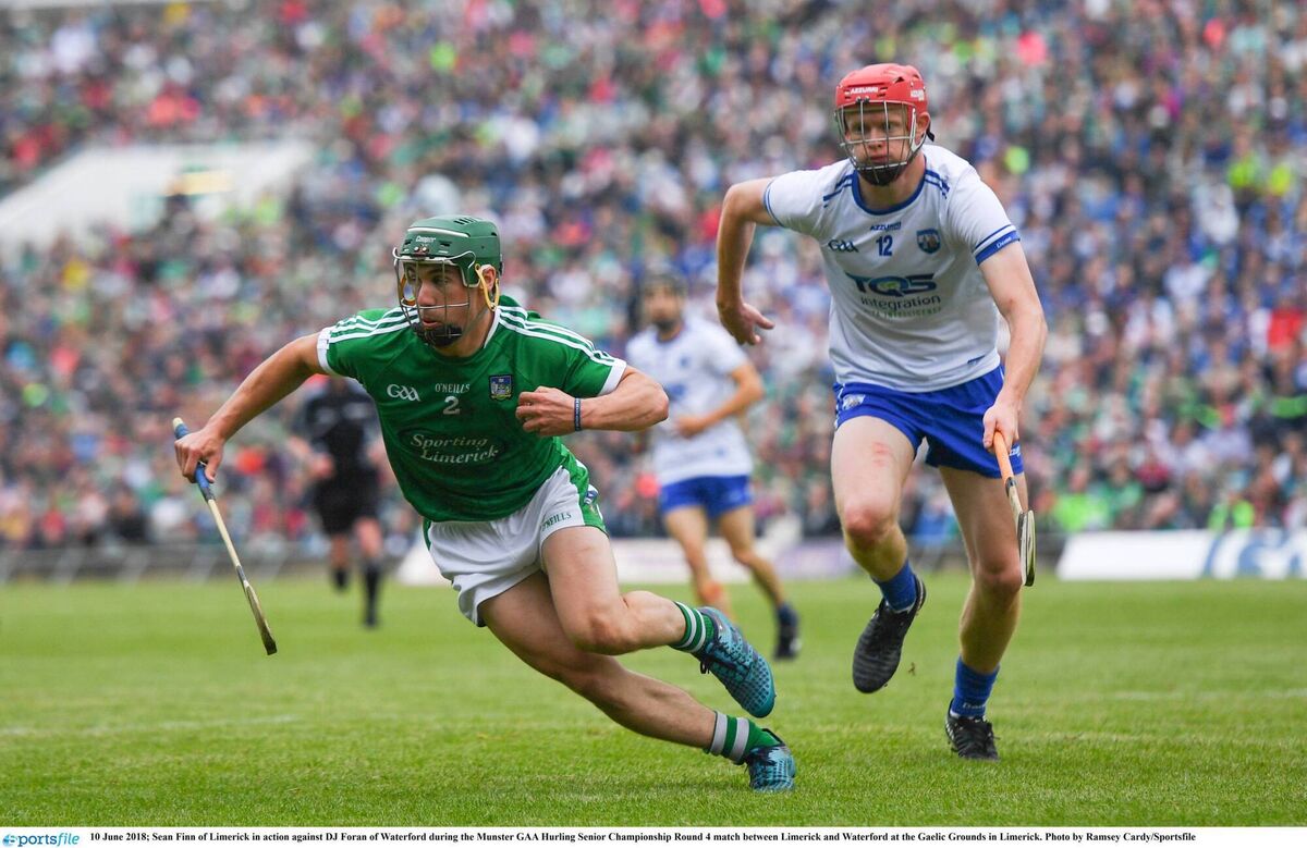 Sean Finn of Limerick in action against DJ Foran of Waterford. Picture: Ramsey Cardy/Sportsfile Sean Finn of Limerick in action against DJ Foran of Waterford. Picture: Ramsey Cardy/Sportsfile