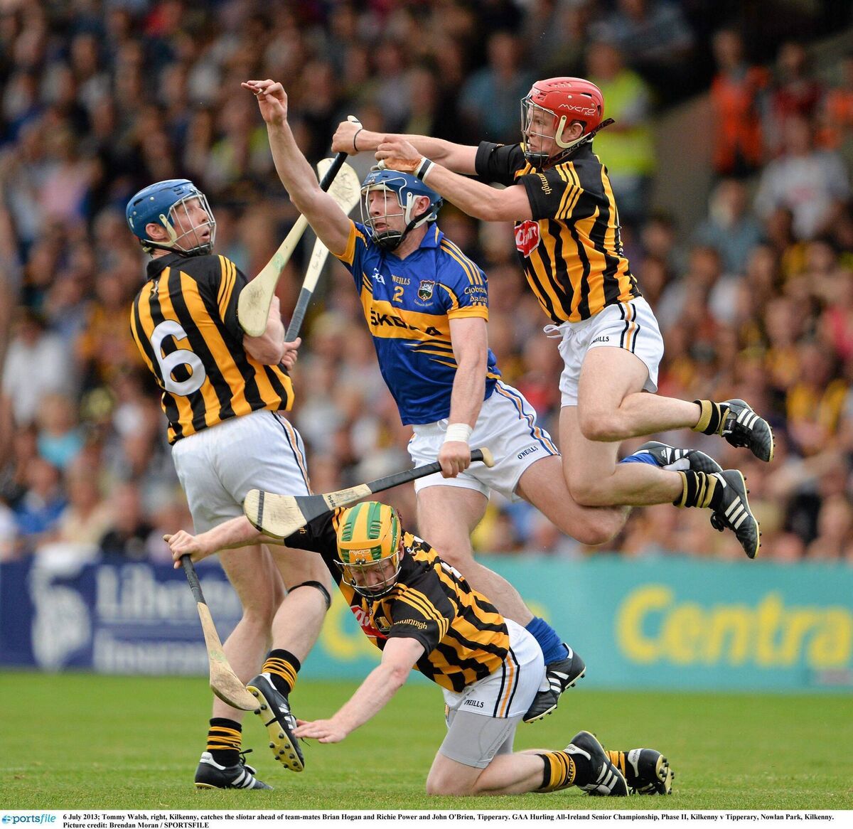 Tommy Walsh, right, Kilkenny, catches the slíotar ahead of team-mates Brian Hogan and Richie Power and John O'Brien, Tipperary. Picture: Brendan Moran/SPORTSFILE Tommy Walsh, right, Kilkenny, catches the slíotar ahead of team-mates Brian Hogan and Richie Power and John O'Brien, Tipperary. Picture: Brendan Moran/SPORTSFILE