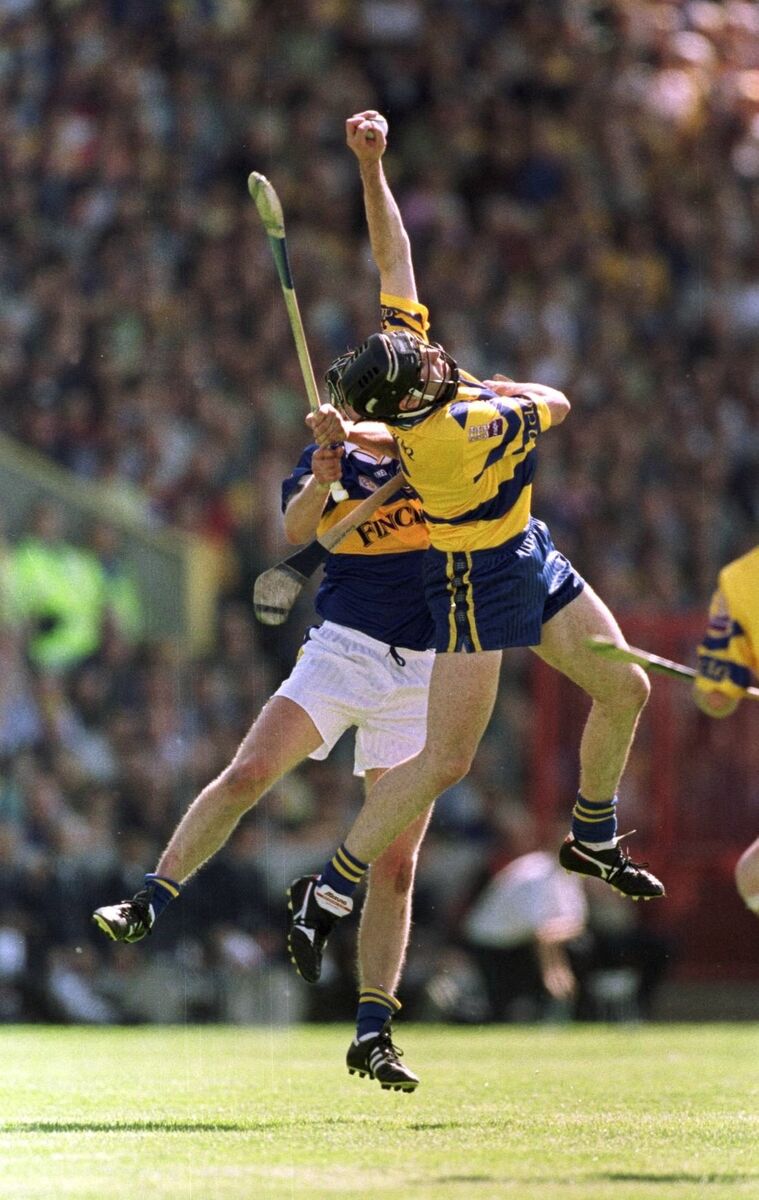 Sean McMahon of Clare wins the ball ahead of Eddie Enright of Tipperary in 2001. Picture: INPHO/Patrick Bolger Sean McMahon of Clare wins the ball ahead of Eddie Enright of Tipperary in 2001. Picture: INPHO/Patrick Bolger