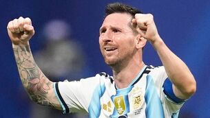 <p>Police in central London stepped in to rescue a lone Argentina fan as supporters left pubs and bars following England’s World Cup semi-final heartbreak. Picture: AP Photo/Mike Stewart.</p>