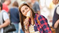 Woman eating Ice cream on vacation travel.