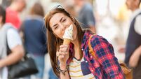 Woman eating Ice cream on vacation travel.