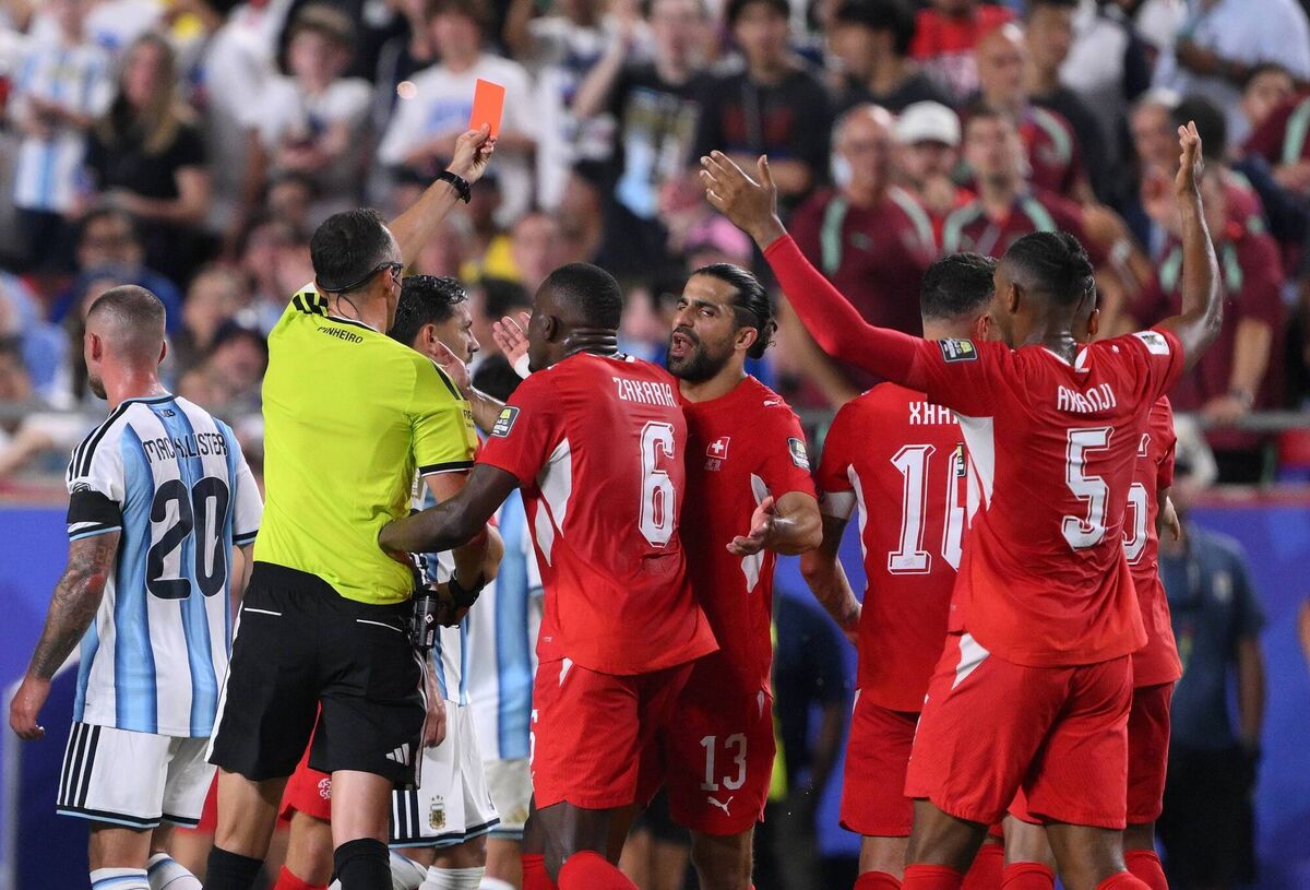 After consulting VAR Referee Joao Pinheiro shows a red card to Breel Embolo against Argentina. Pic: David Ramos/Getty After consulting VAR Referee Joao Pinheiro shows a red card to Breel Embolo against Argentina. Pic: David Ramos/Getty