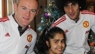 Manchester United stars make young fans' day with visit to local hospital