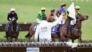 <p>A steward flags for a false start. Pic: Healy Racing Photo.</p> <p>A steward flags for a false start. Pic: Healy Racing Photo.</p>
