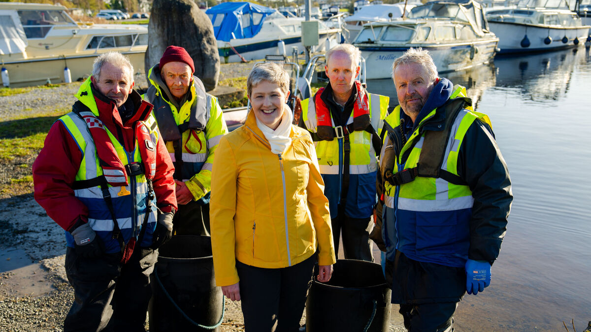 Geographer Susan Hegarty with the O'Connell brothers of the ESB Fisheries Team Athlone in new series Building Ireland kicking Geographer Susan Hegarty with the O'Connell brothers of the ESB Fisheries Team Athlone in new series Building Ireland kicking