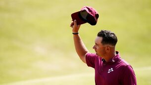 <p>JOINT RECORD HOLDER: Lucas Herbert after putting on the 18th green during day two of The 154th Open Championship at Royal Birkdale.</p>