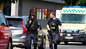 Police at the scene of the shooting (Henning Bagger/Ritzau Scanpix/AP) Police at the scene of the shooting (Henning Bagger/Ritzau Scanpix/AP)