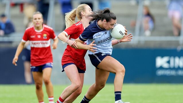 <p>Dublin's Niamh Hetherton and Grace Murphy of Cork. Pic: Laszlo Geczo/Inpho</p>