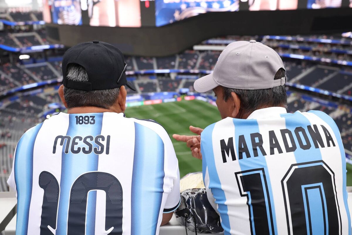 Fans wearing replica shirts of Messi and Maradona inside the stadium before the match between South Africa and Canada at Los Angeles Stadium in California. Picture: Alex Grimm/Getty Fans wearing replica shirts of Messi and Maradona inside the stadium before the match between South Africa and Canada at Los Angeles Stadium in California. Picture: Alex Grimm/Getty