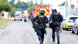 Police respond near the scene of a shooting in Norresundby, in northern Denmark (Henning Bagger/Ritzau Scanpix via AP) Police respond near the scene of a shooting in Norresundby, in northern Denmark (Henning Bagger/Ritzau Scanpix via AP)