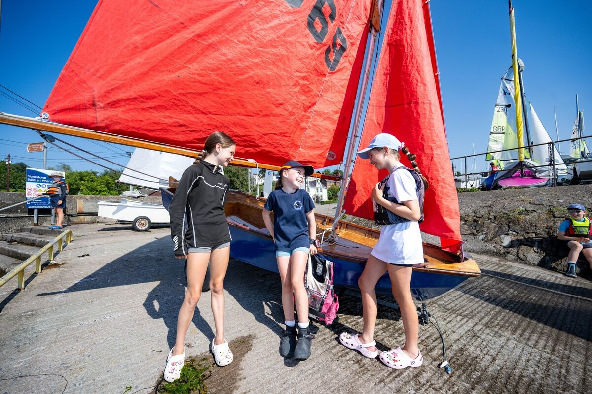 Beatrice O’Sullivan, Mary Keneally, and Eva Ryan enjoy the sunshine during a sailing camp in Monkstown, Co Cork. Picture: Chani Anderson