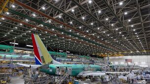 Boeing employees work on a 737 MAX airplane on the final assembly line at Boeing’s plant in Renton, Washington (Ellen M Banner/The Seattle Times via AP, Pool, File) Boeing employees work on a 737 MAX airplane on the final assembly line at Boeing’s plant in Renton, Washington (Ellen M Banner/The Seattle Times via AP, Pool, File)