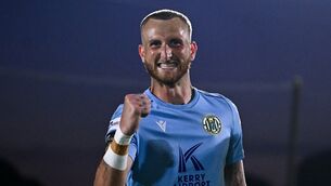 <p>Kerry FC goalkeeper Harry Halwax celebrates. Pic: David Fitzgerald/Sportsfile</p>
