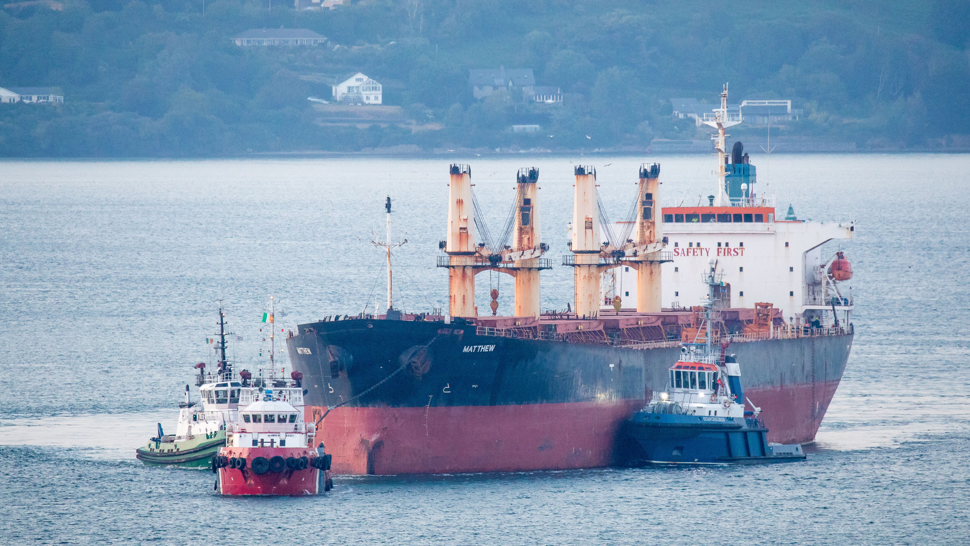  The MV Matthew, escorted by tugs Foteni, Ocean Challanger, Alex and Titan, is seen leaving Cork Harbour after almost three years tied up at the port since her seizure in September 2023. Picture: David Creedon
