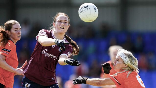 <p>Niamh Divilly in action against Lauren McConville of Armagh. Pic: James Lawlor/Inpho</p>