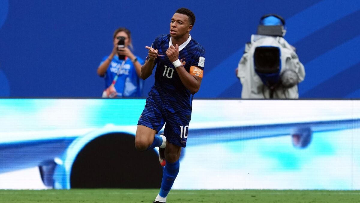 France's Kylian Mbappe celebrates scoring his sides third goal and subsequently breaking the record for most goals scored by a player in the history of the World Cup. Pic: Martin Rickett/PA France's Kylian Mbappe celebrates scoring his sides third goal and subsequently breaking the record for most goals scored by a player in the history of the World Cup. Pic: Martin Rickett/PA