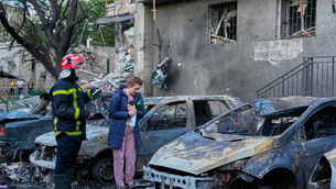 An owner looks at her damaged car following a Russia missile attack in Kyiv (Efrem Lukatsky/AP) An owner looks at her damaged car following a Russia missile attack in Kyiv (Efrem Lukatsky/AP)