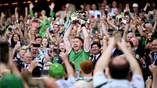 <p>Limerick captain Cian Lynch lifts the Liam MacCarthy Cup. Pic: David Fitzgerald/Sportsfile</p>