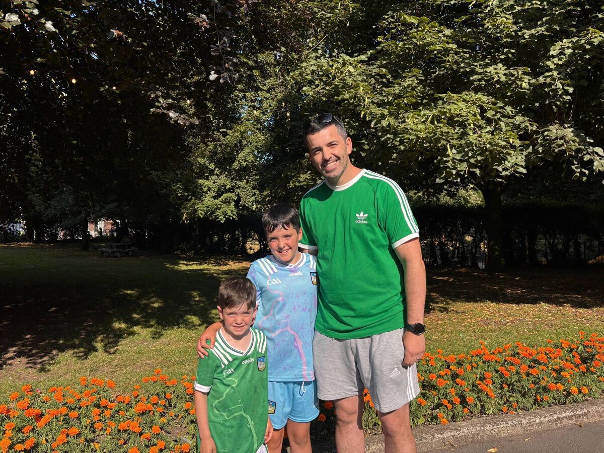 Liam McGraynor welcomed the Limerick hurlers back to the city with his two sons, Ben and Harry. Liam McGraynor welcomed the Limerick hurlers back to the city with his two sons, Ben and Harry.