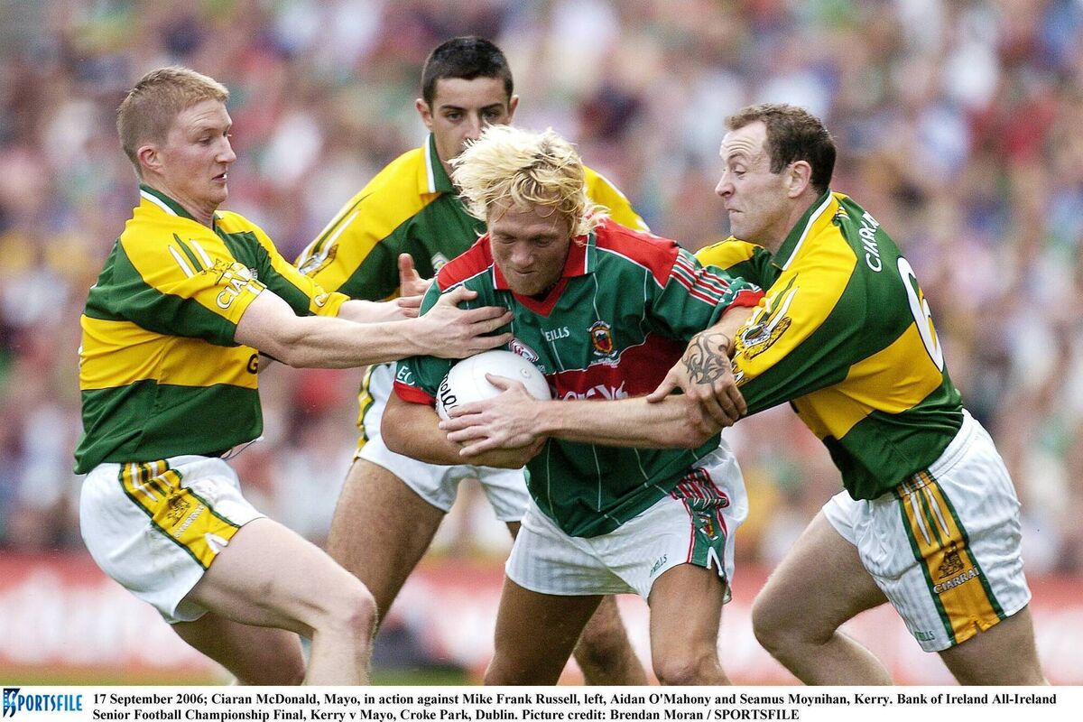 Mayo's Ciaran McDonald struggles to break free from Kerry's  Mike Frank Russell, Aidan O'Mahony and Seamus Moynihan in the 2006 final. Pic: Brendan Moran, Sportsile.